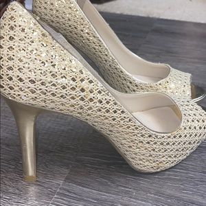 Sparkly gold high heels